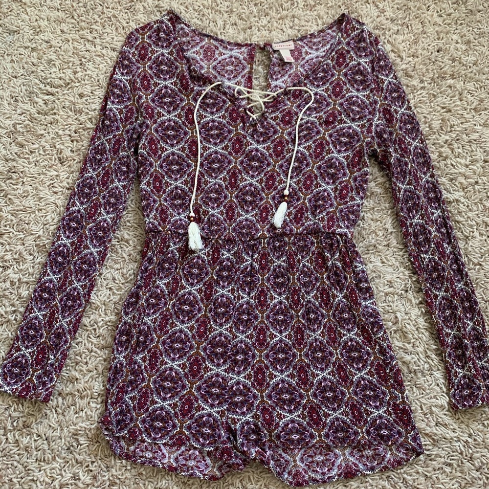 Patterned tassel front long sleeve romper
